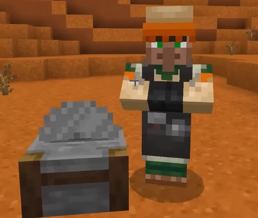 Minecraft villager standing by a profession workstation in a screenshot from Xbox Minecraft gameplay