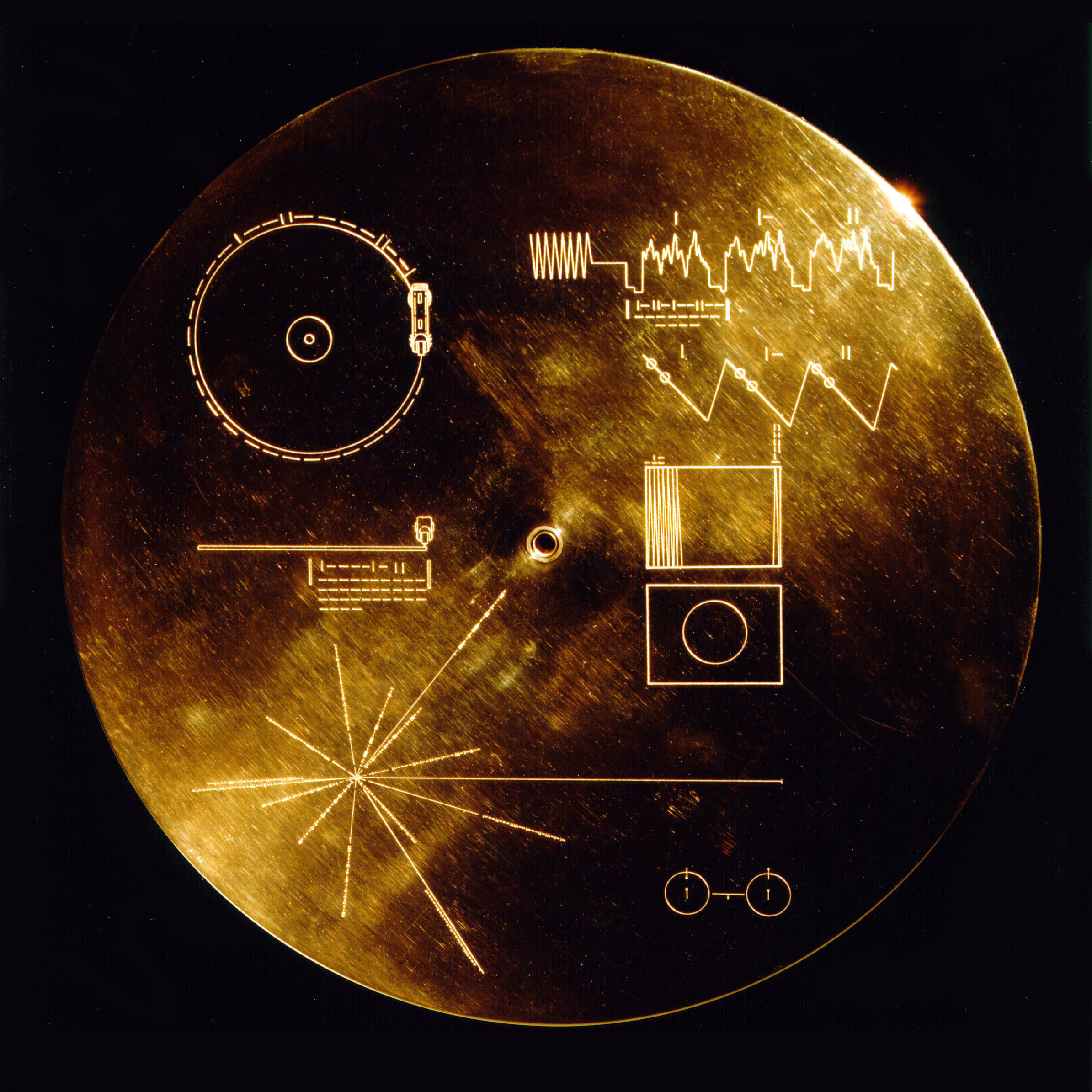 Actual Voyager Golden Record cover with scientific playback instructions and pulsar map