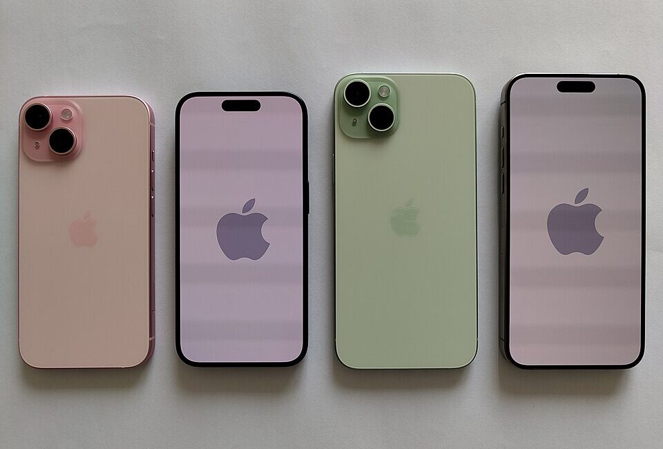 Apple iPhone 15 photographed from an angle to illustrate deleting iPhone Lock Screen wallpapers