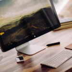 Real office desktop setup showing computer monitor and keyboard