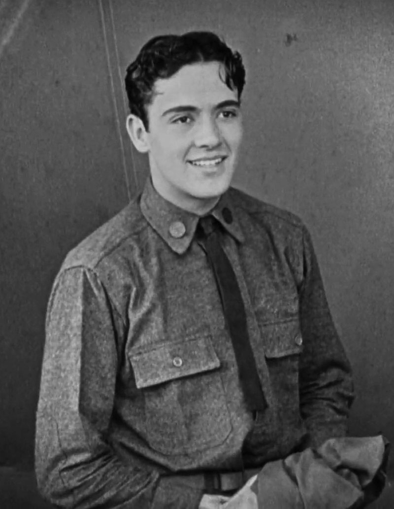 Buddy Rogers portraying Jack Powell in an authentic 1927 Wings film-trailer frame