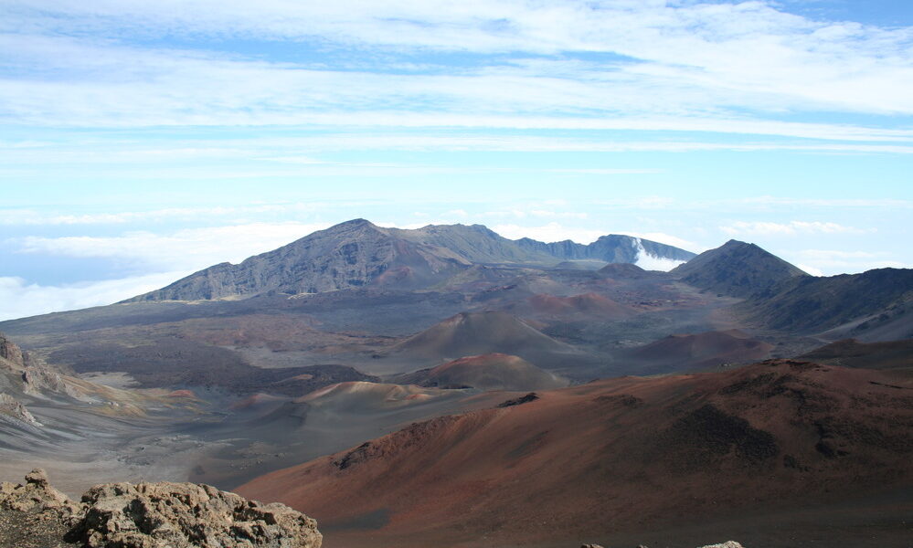 Colorful red and brown Haleakala crater basin on Maui seen from the national park visitor center
