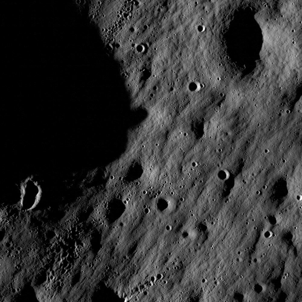 Authentic lunar crater photograph captured by NASA Lunar Reconnaissance Orbiter camera PIA12884