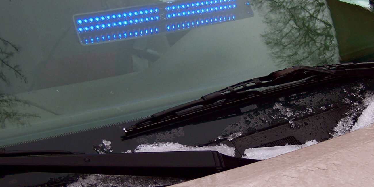 Blue emergency vehicle courtesy lights illustrating the cops versus thieves theme of Roblox ManHunt; not a gameplay image