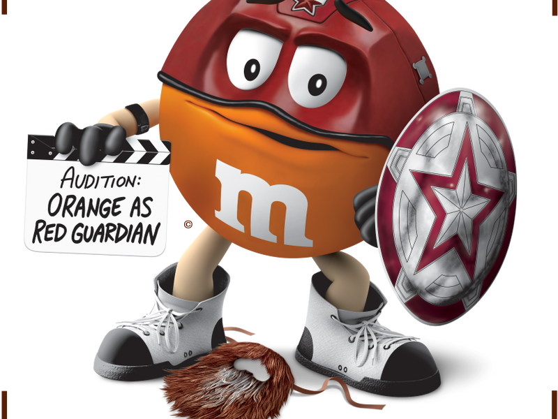 Orange M&M's Spokescandy dressed as Marvel's Red Guardian in an official Marvel and M&M's promotional illustration