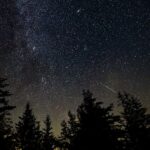 A meteor streaks across a dark night sky in West Virginia, photographed by NASA in August 2025; illustrative image for the 2026 Draconid meteor shower