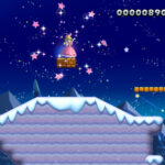 Actual Nintendo Switch New Super Mario Bros U Deluxe gameplay on a colorful side-scrolling Mario level