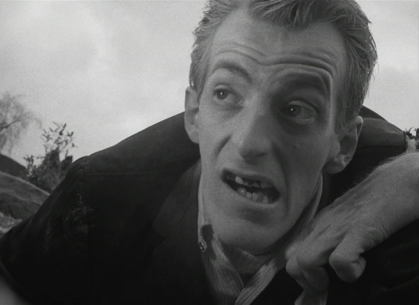 Genuine frame from the 1968 Night of the Living Dead, with Bill Hinzman portraying the cemetery ghoul