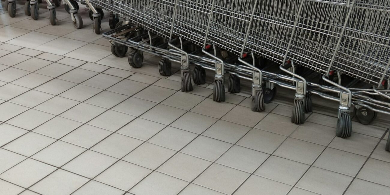 Row of shopping carts representing October Prime Day 2026 last-minute deals