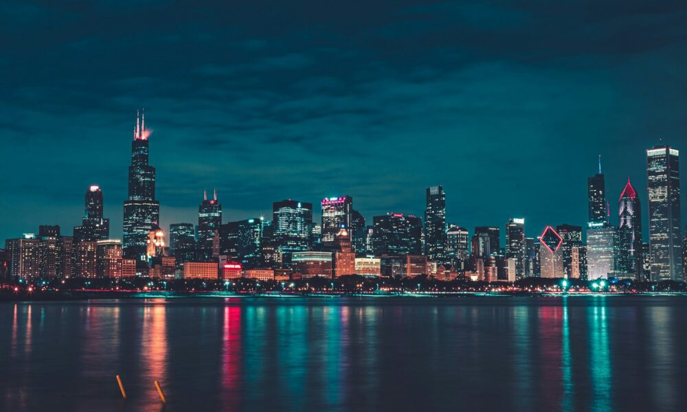 Chicago skyline at night illustrating the One Chicago October 7 premieres