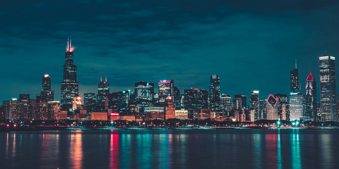 Chicago skyline at night illustrating the One Chicago October 7 premieres