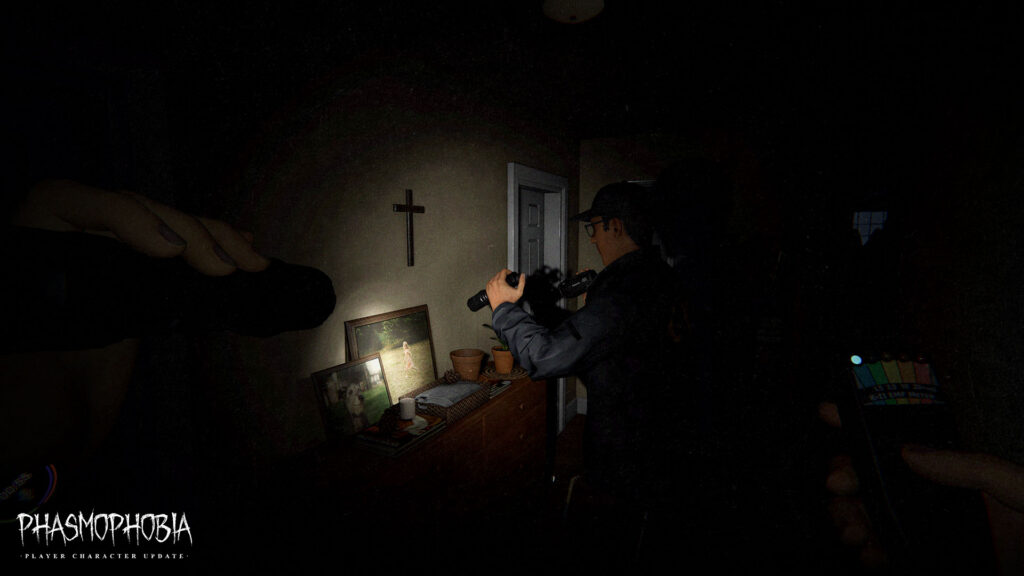Real Phasmophobia Xbox Series gameplay screenshot with a ghost investigator using an EMF reader in a dark haunted house