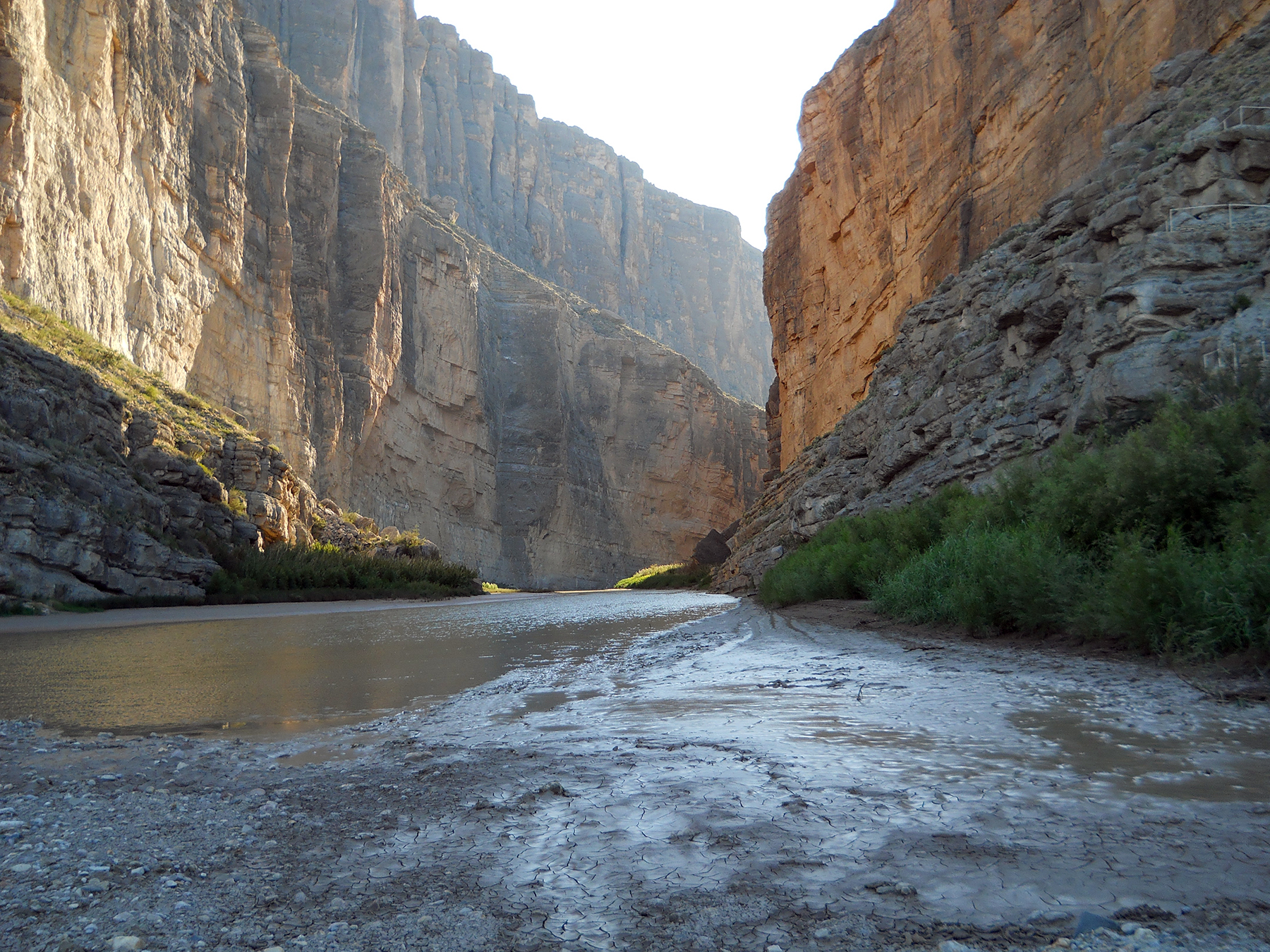 Authentic photograph from inside Santa Elena Canyon in Big Bend National Park: the Rio Grande winds below steep limestone walls beside the route of the Santa Elena Canyon Trail.