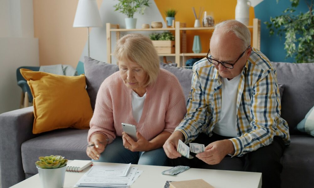 Social Security Payment Schedule October 2026: Exact Dates Older couple reviewing household finances for a Social Security COLA planning guide