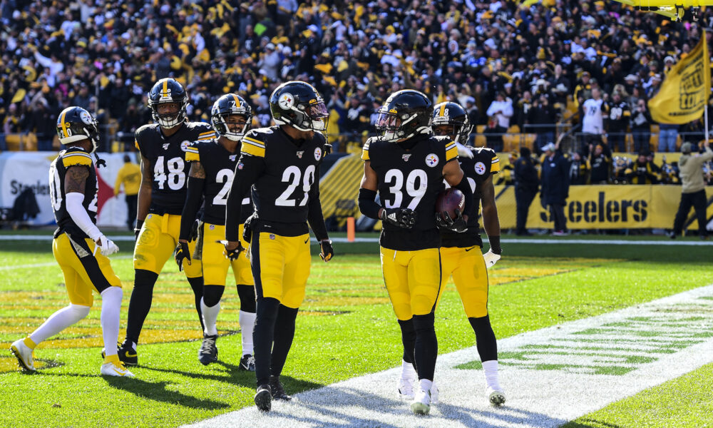 Archive 2019 Steelers and Colts game photo showing Pittsburgh defenders celebrating