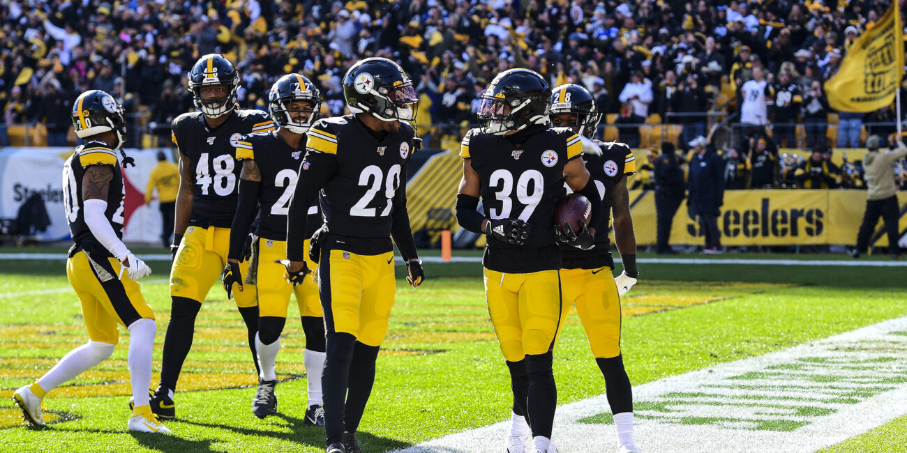 Archive 2019 Steelers and Colts game photo showing Pittsburgh defenders celebrating